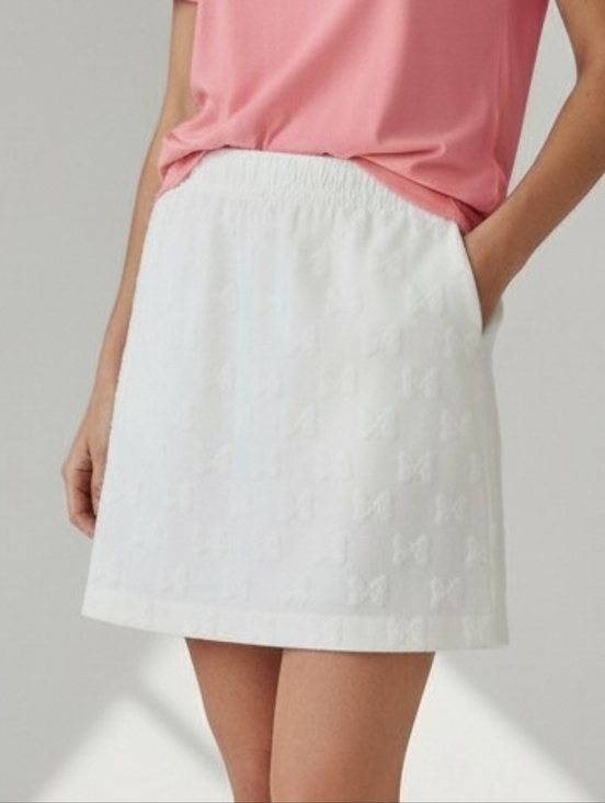 Disney Dresses & Skirts - NWT Disney Ivory Mini Skirt with Bow Motif For Minnie Mouse